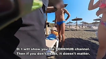 Italian Nudist Girl Gives A Blowjob To A Stranger On The Beach While Being Watched By Old Men