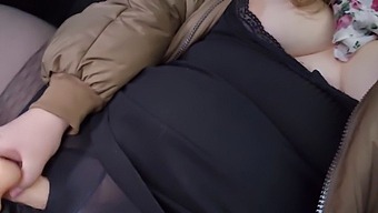 Voluptuous Girl With Large Breasts Pleasures Herself In A Taxi'S Rear Seat