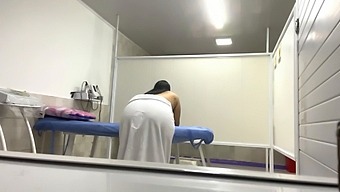 A Mature Patient With Big Natural Tits Gets Oiled Up In The Doctor'S Office